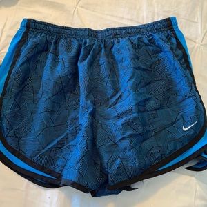 Blue Nike athletic shorts